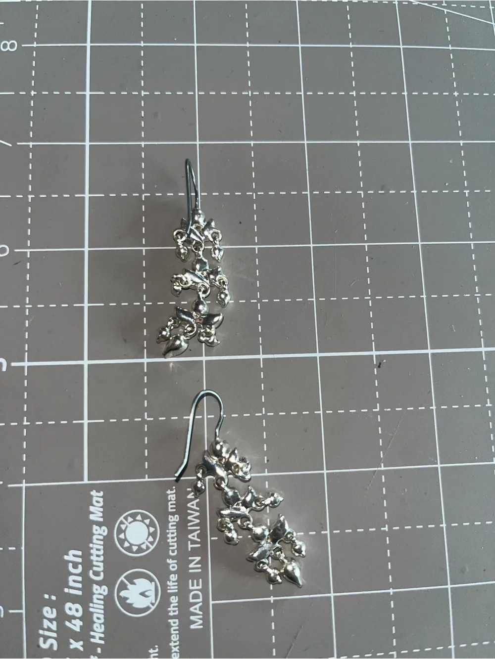 Dangling drop rhinestone earrings silver tone